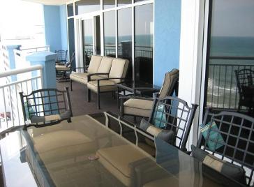 Only condo in entire building with Dining table on Balcony - Ocean Blue Resort Direct Ocean Front Balcony from www.JeffsCondos.com