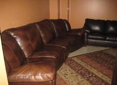 Ocean Blue Private Media Room with Luxury Leather Sofas with Recliners - Vacation Rentals Myrtle Beach